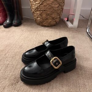 Steve Madden Black Mules with Gold Buckle